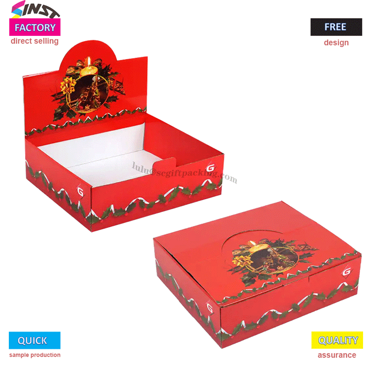 La classica combinazione di colori del espositore da tavolo di Natale accende la sensazione della cerimonia festiva del desktop